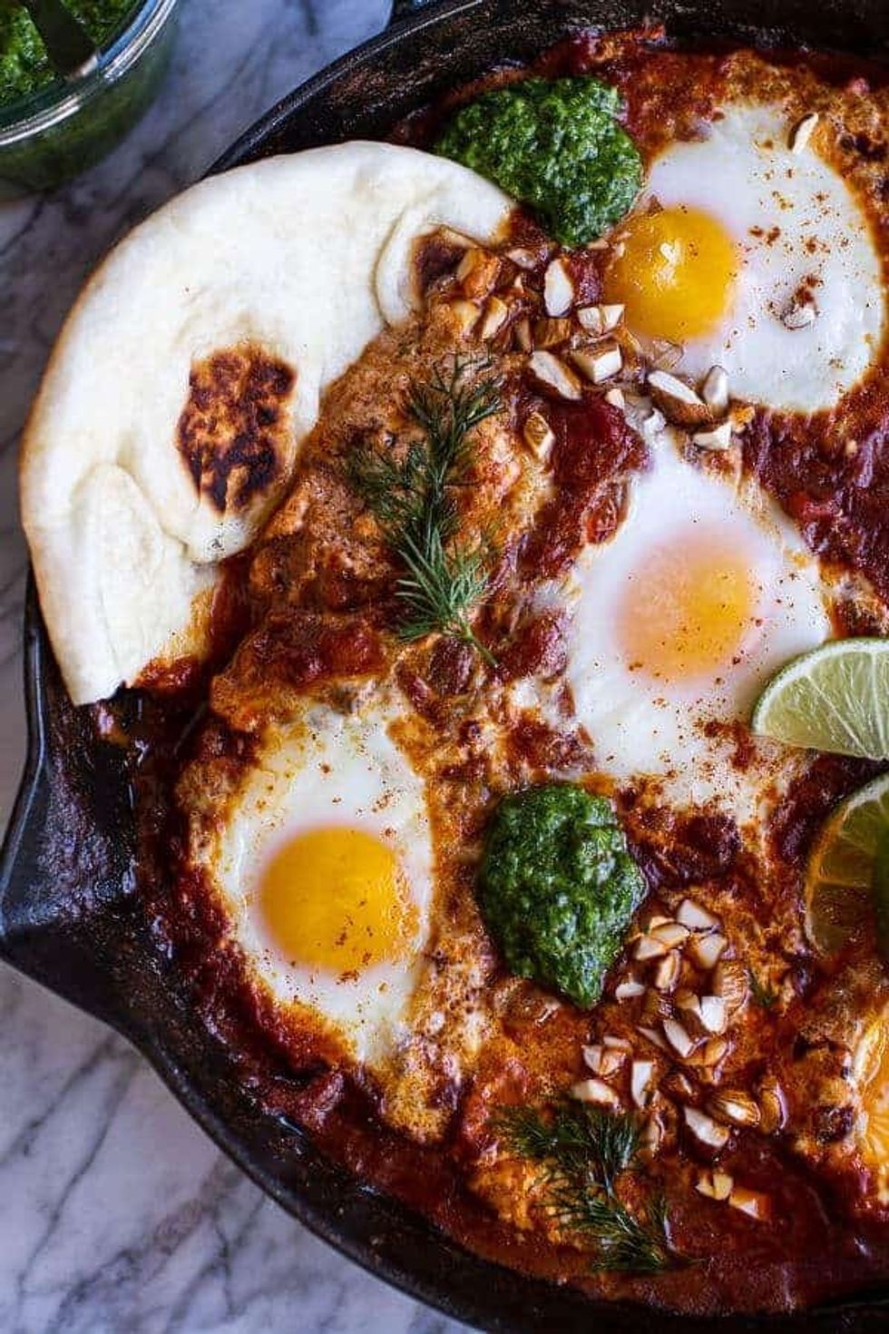 Indian Style Baked Eggs with Green Harissa + Naan