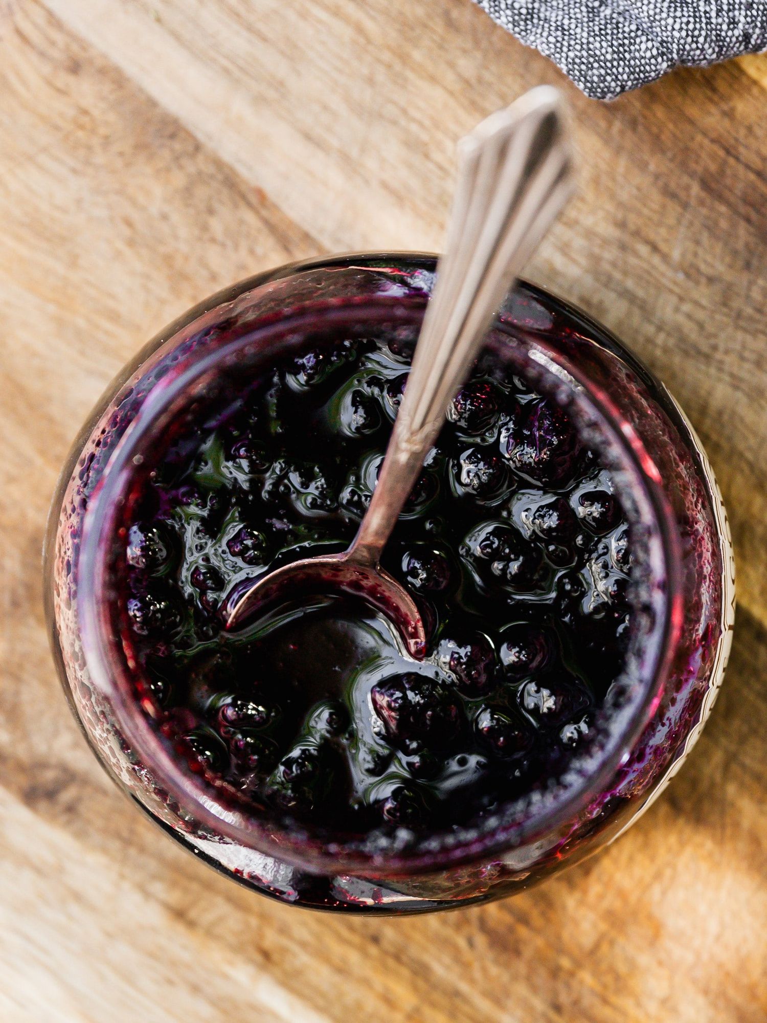 jam jar with blueberries from above
