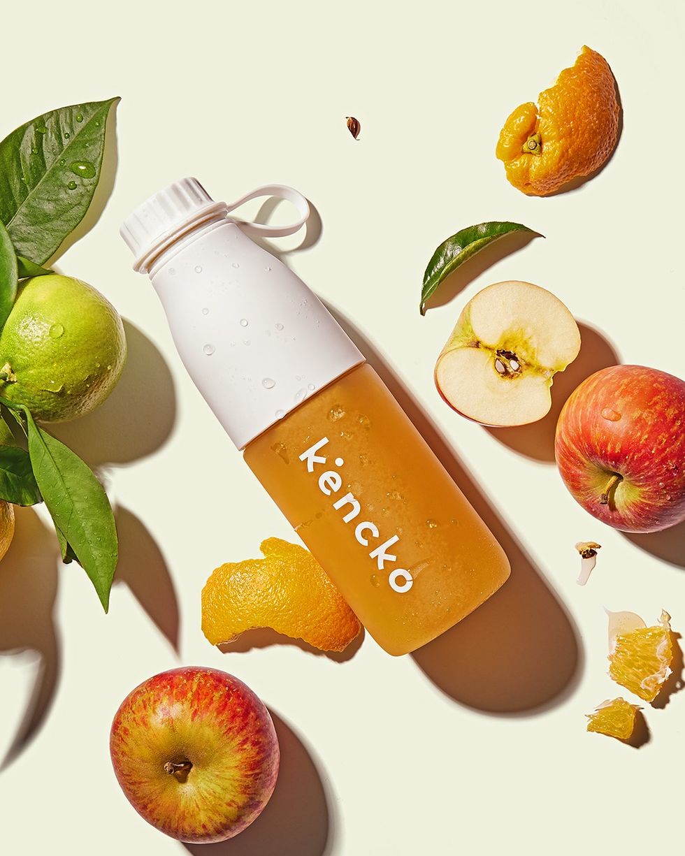 kencko smoothie surrounded by fruits