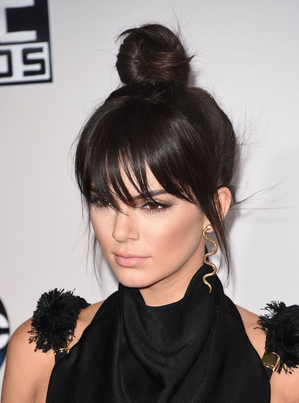 Kendall Jenner rocking a faux bangs hairstyle.