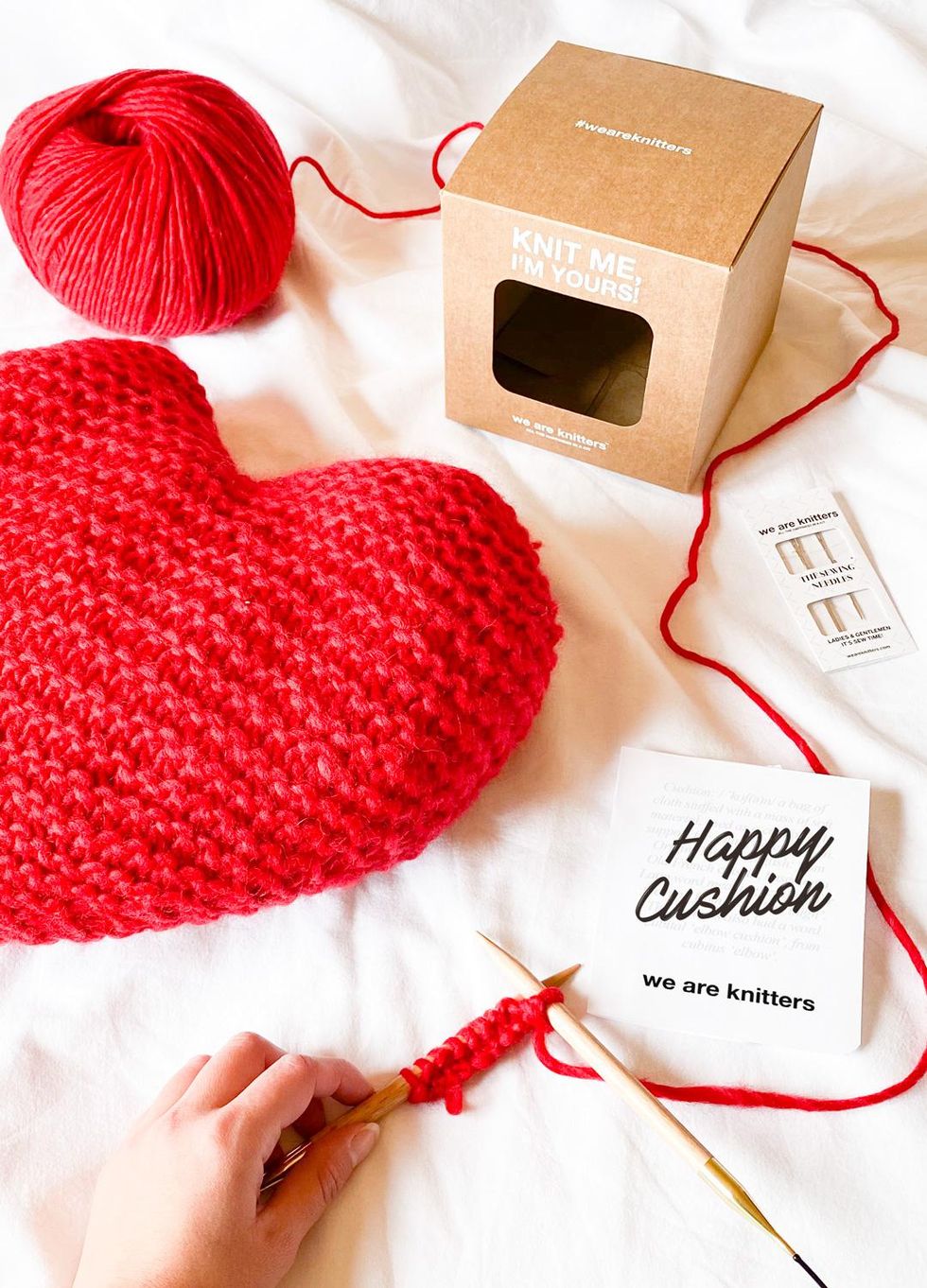 Knitting kit with red yarn