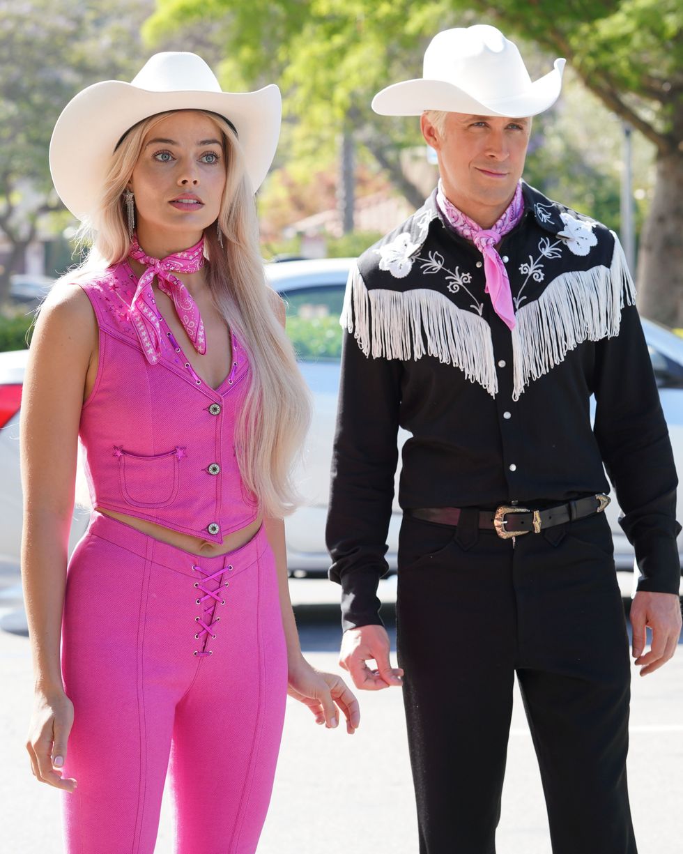 (L-r) MARGOT ROBBIE as Barbie and RYAN GOSLING as Ken and in Warner Bros. Pictures\u2019 \u201cBARBIE"