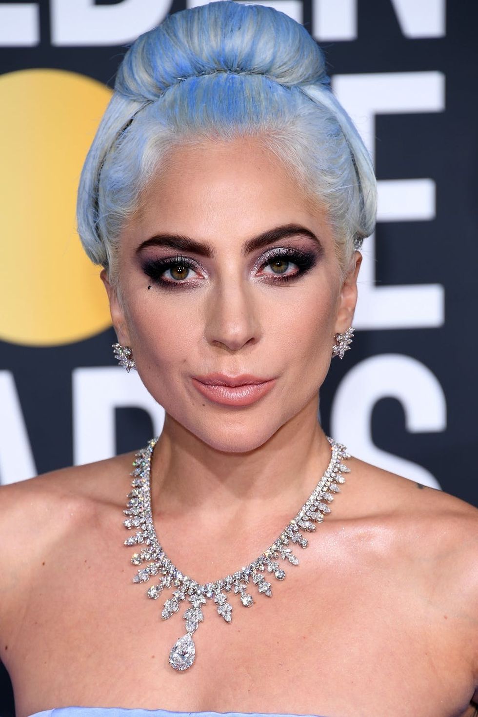 Lady Gaga rocking blue hair at the Golden Globes Awards.