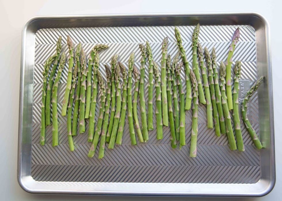 Lay the asparagus onto a baking sheet in a single layer.