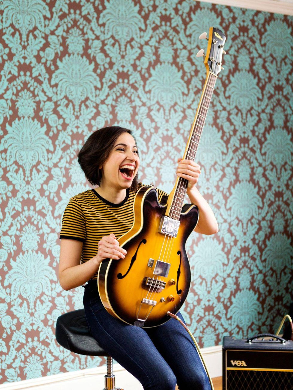 learn to play the guitar as a hobby Audrey Hepburn