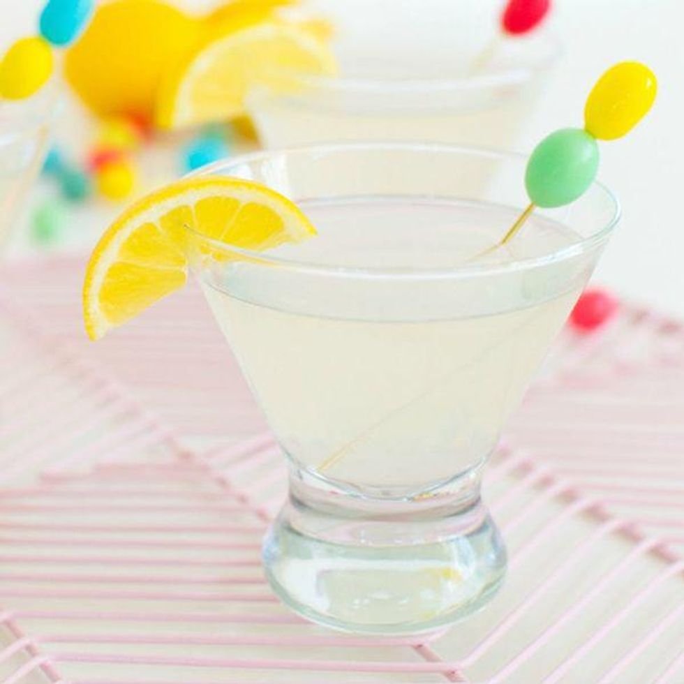 Lemon Drop Sparkletini with rainbow jelly beans and lemons