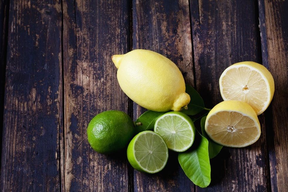 Lemons and Limes on Wood