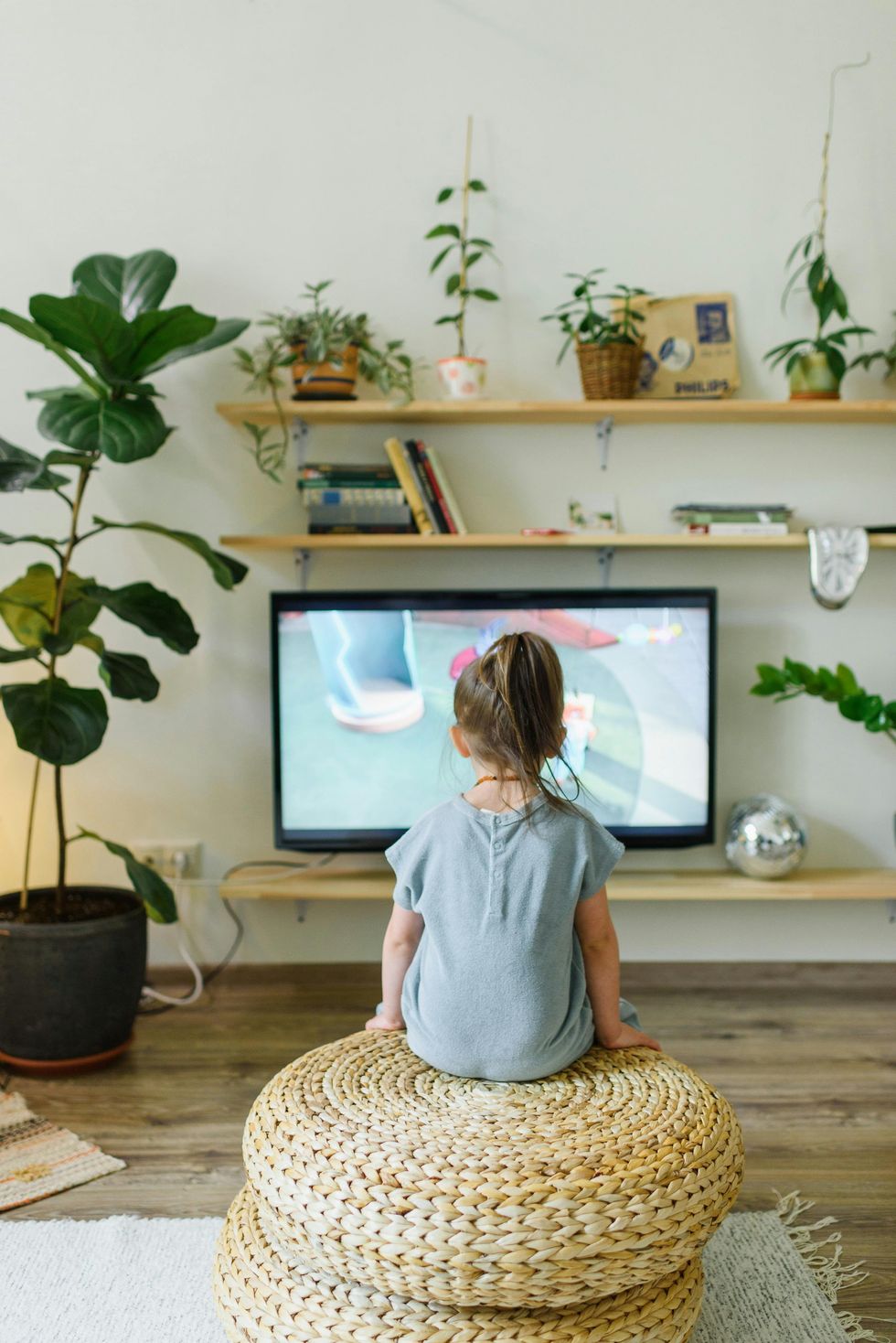 little girl watching TV