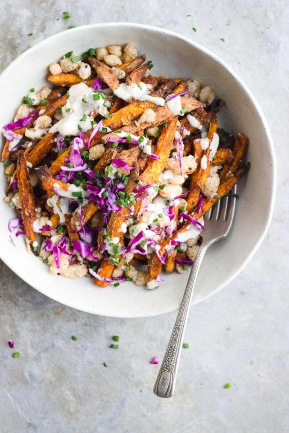 Loaded Sweet Potato Fries With Crispy Beans and Garlic Tahini Cream