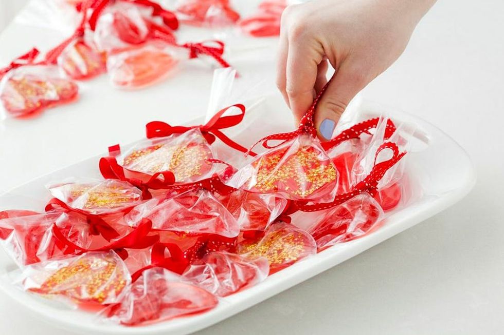 lollipops with gold stars and red ribbons