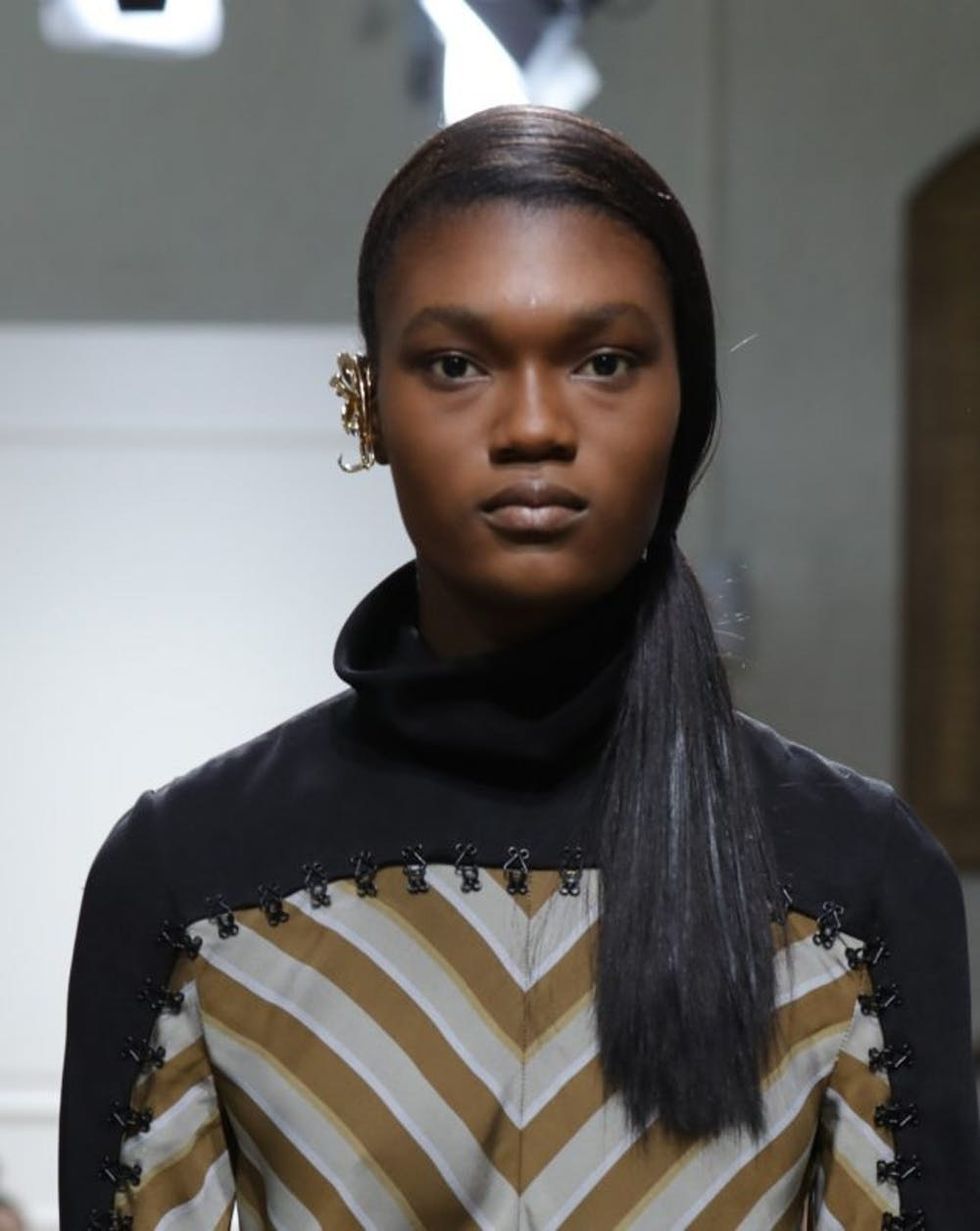 LONDON, ENGLAND - FEBRUARY 18: A model walks the runway at J.W.Anderson show during the London Fashion Week February 2017 collections on February 18, 2017 in London, England. (Photo by Antonio de Moraes Barros Filho/WireImage)