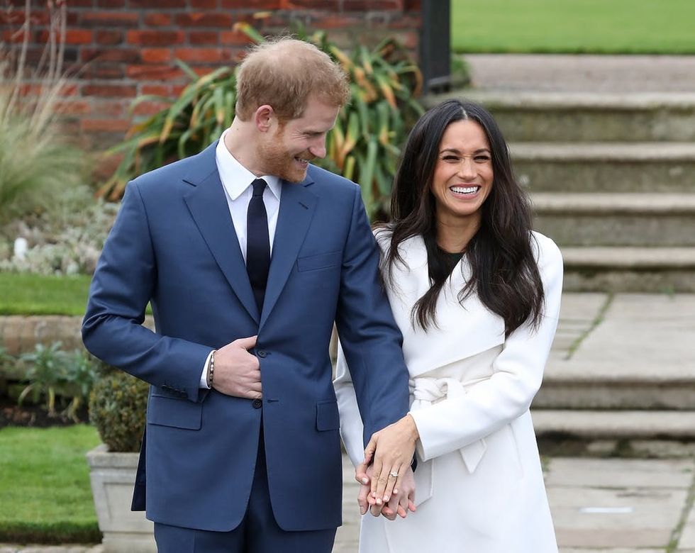 LONDON, ENGLAND - NOVEMBER 27: Prince Harry and actress Meghan Markle during an official photocall to announce their engagement at The Sunken Gardens at Kensington Palace on November 27, 2017 in London, England. Prince Harry and Meghan Markle have been a couple officially since November 2016 and are due to marry in Spring 2018. (Photo by Chris Jackson/Chris Jackson/Getty Images)