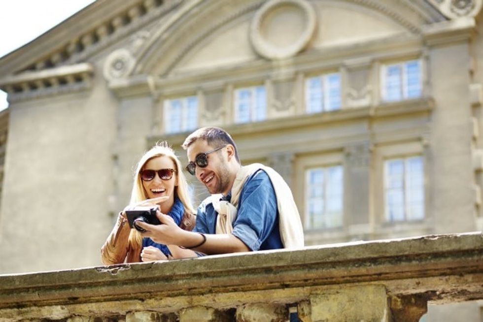 Looking at vacation pictures