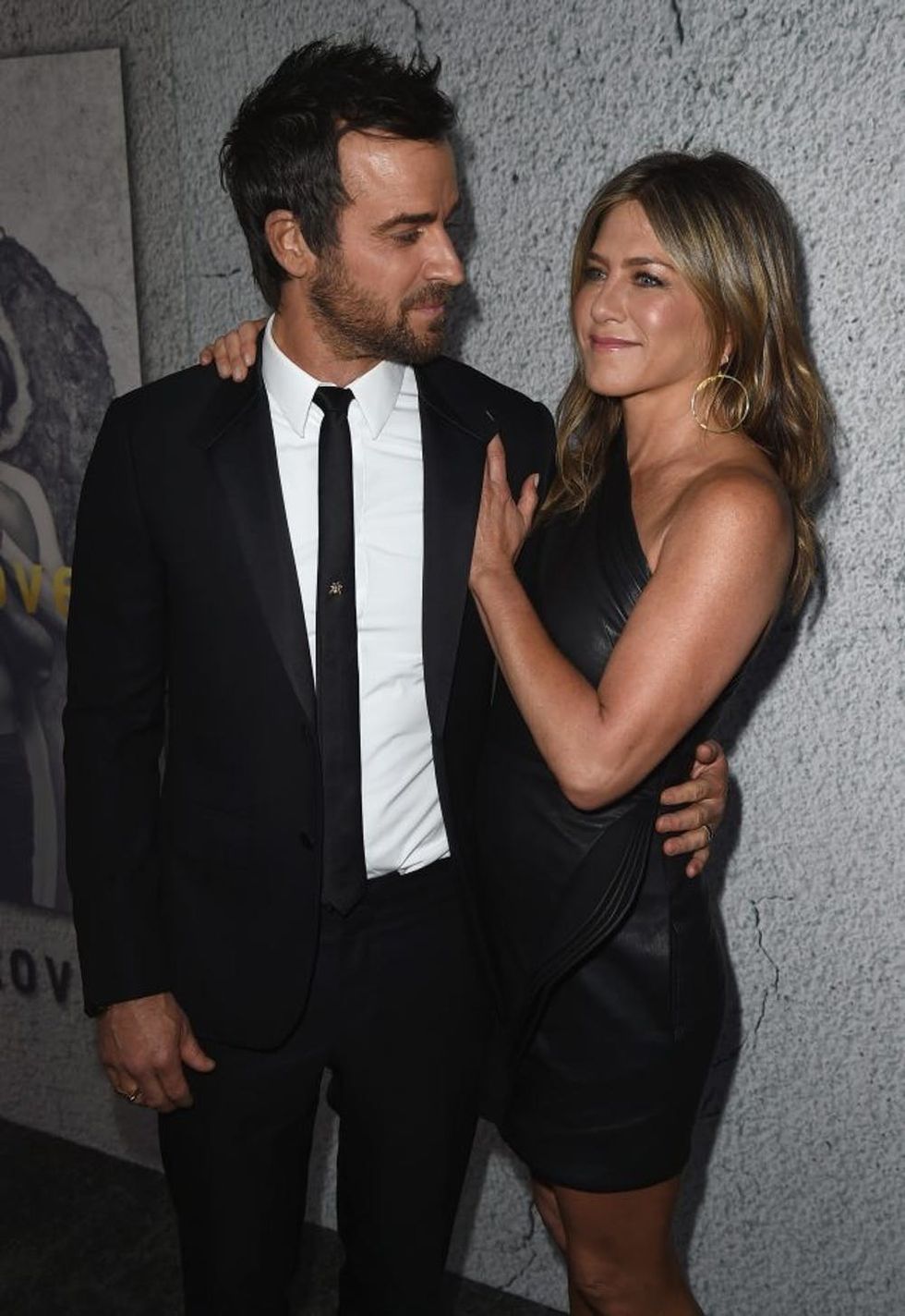 LOS ANGELES, CA - APRIL 04: Actors Justin Theroux and Jennifer Aniston attend the premiere of HBO's 