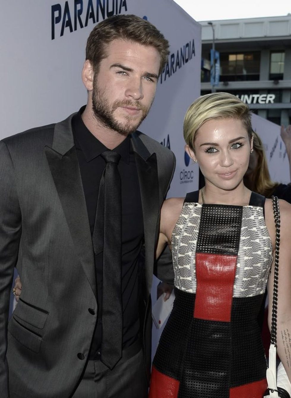LOS ANGELES, CA - AUGUST 08: Actor Liam Hemsworth and actress Miley Cyrus attend the premiere of Relativity Media's "Paranoia" at the DGA Theater on August 8, 2013 in Los Angeles, California. (Photo by Kevin Winter/Getty Images)