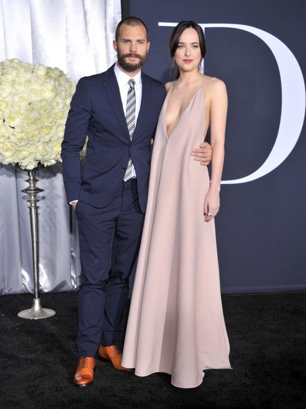 LOS ANGELES, CA - FEBRUARY 02: Actors Jamie Dornan and Dakota Johnson arrive at the premiere of Universal Pictures' "Fifty Shades Darker" at The Theatre at Ace Hotel on February 2, 2017 in Los Angeles, California. (Photo by Gregg DeGuire/WireImage)
