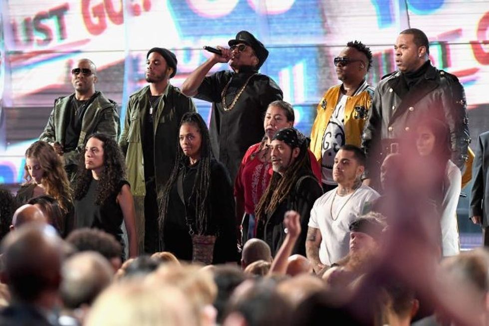 LOS ANGELES, CA - FEBRUARY 12: A Tribe Called Quest performs onstage during The 59th GRAMMY Awards at STAPLES Center on February 12, 2017 in Los Angeles, California. (Photo by Kevork Djansezian/Getty Images)