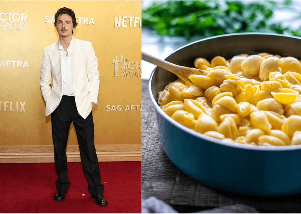 Man in a white jacket on a red carpet; bowl of cheesy pasta next to him.