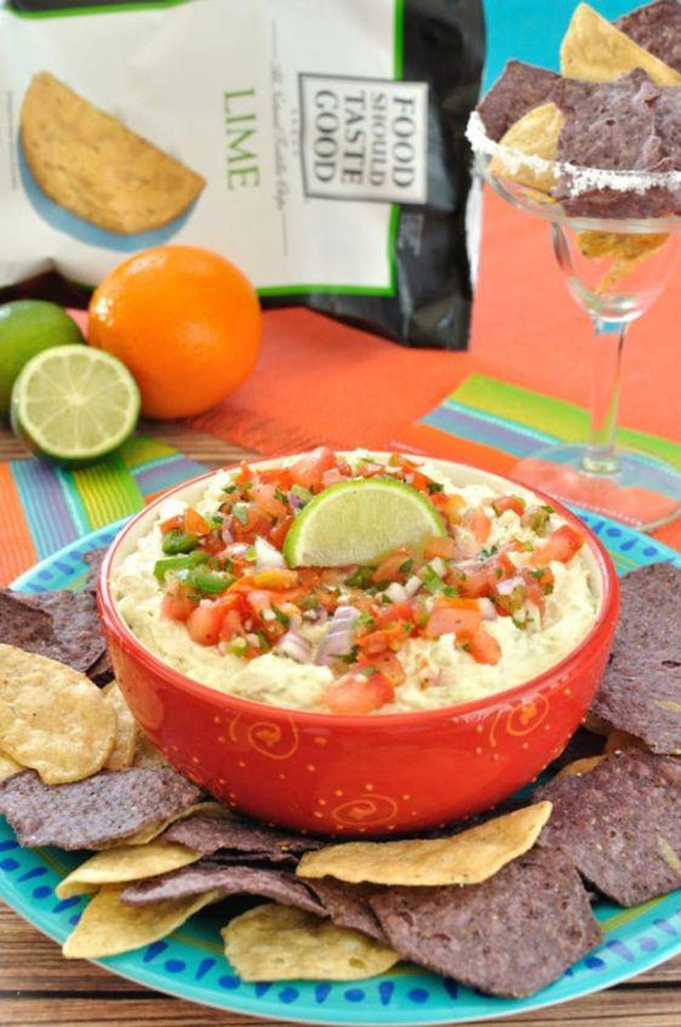 margarita chicken dip with blue and yellow corn chips