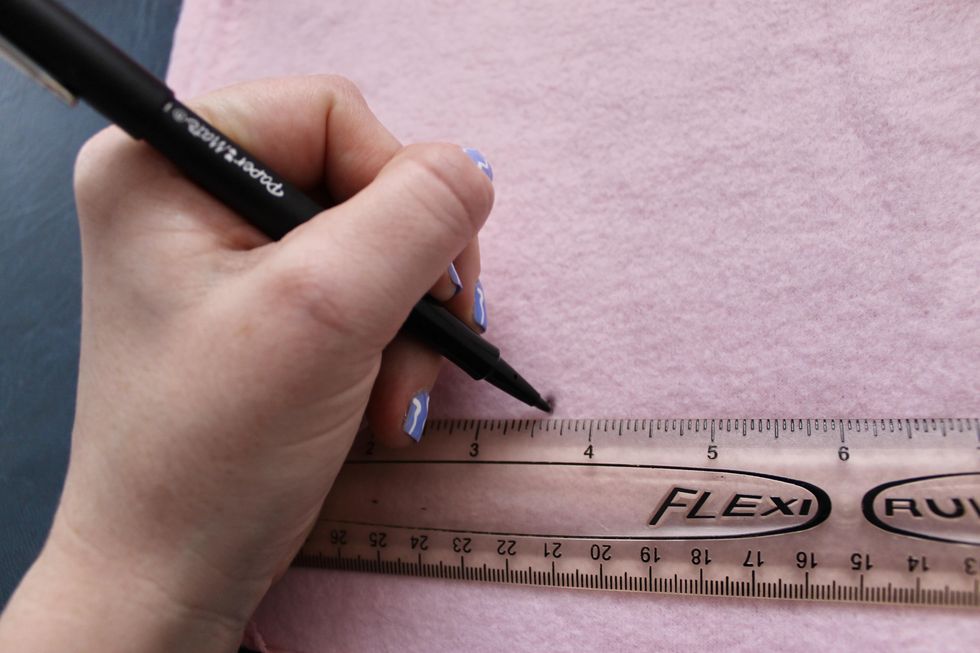 marking measurements on the fleece DIY Taylor Swift Fuzzy Dice
