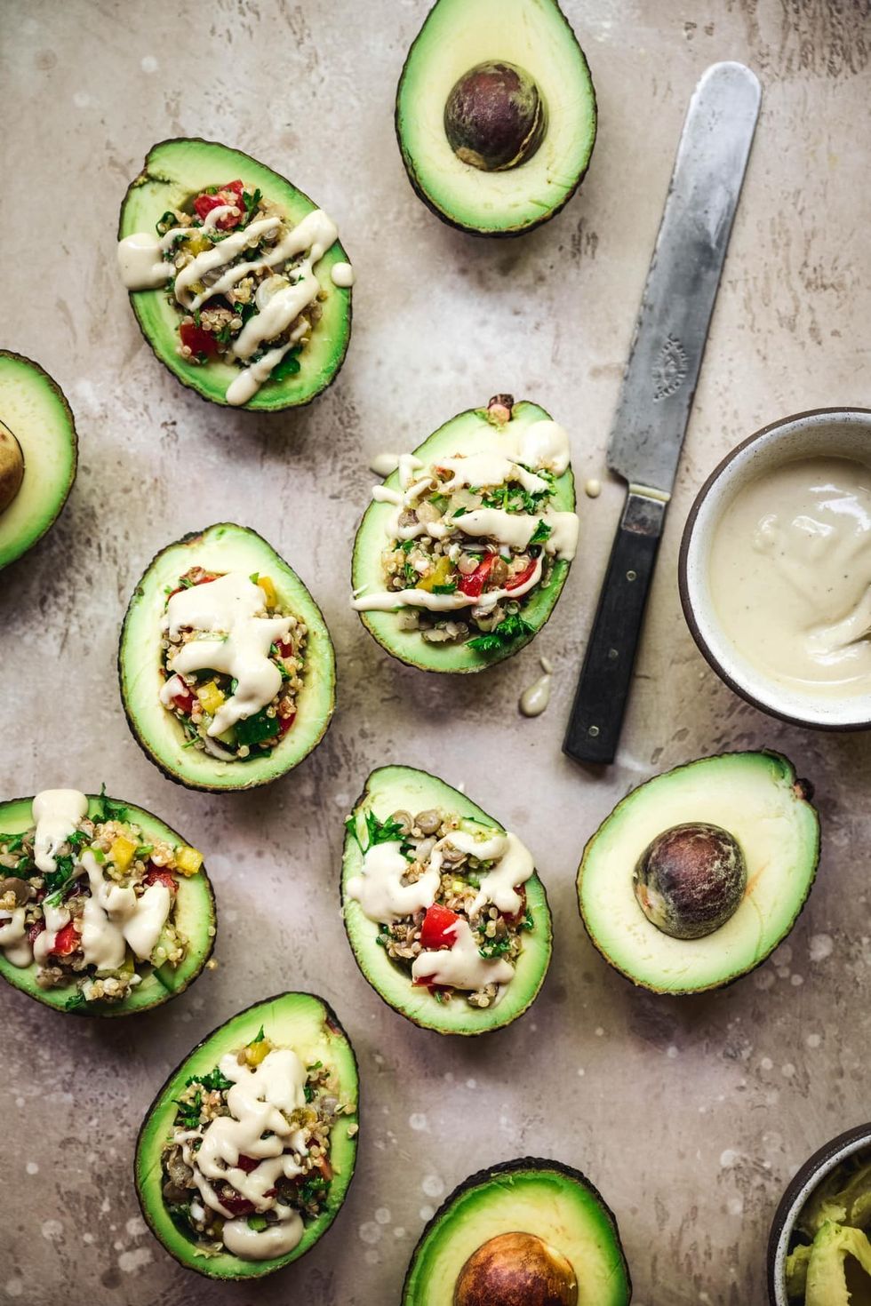 Mediterranean Stuffed Avocados with Tahini Dressing