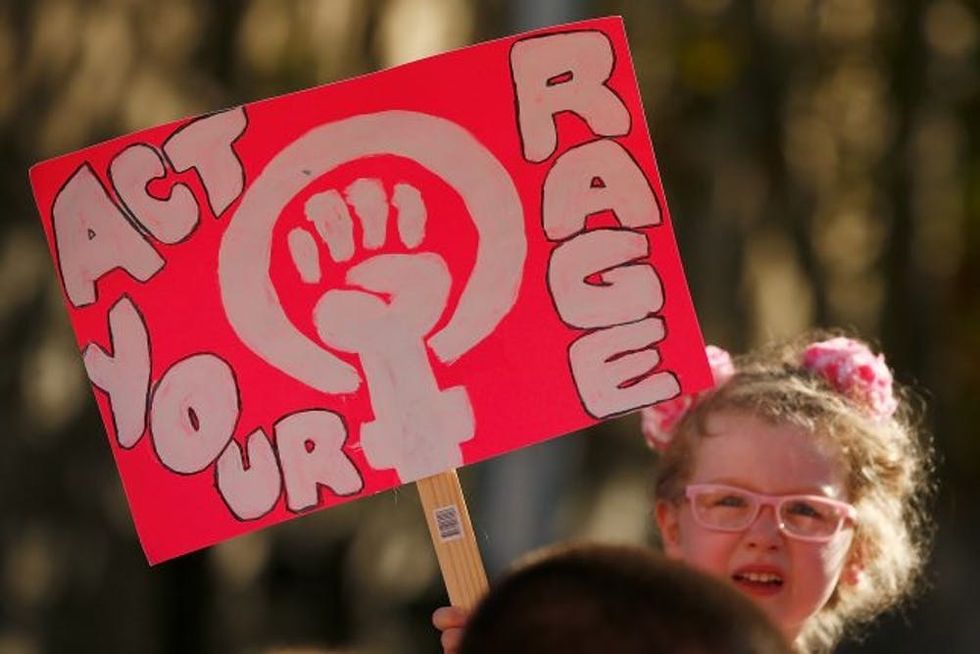 MELBOURNE, AUSTRALIA - MARCH 08: Thousands of demonstrators attend a rally for International Women's Day on March 8, 2017 in Melbourne, Australia. Marchers were calling for de-colonisation of Australia, an end to racism, economic justice for all women and reproductive justice, as well as supporting the struggle for the liberation of all women around the world, inclusive of trans women and sex workers. (Photo by Daniel Pockett/Getty Images)