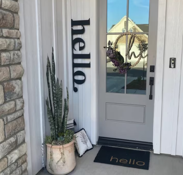 metal "hello" welcome wall sign