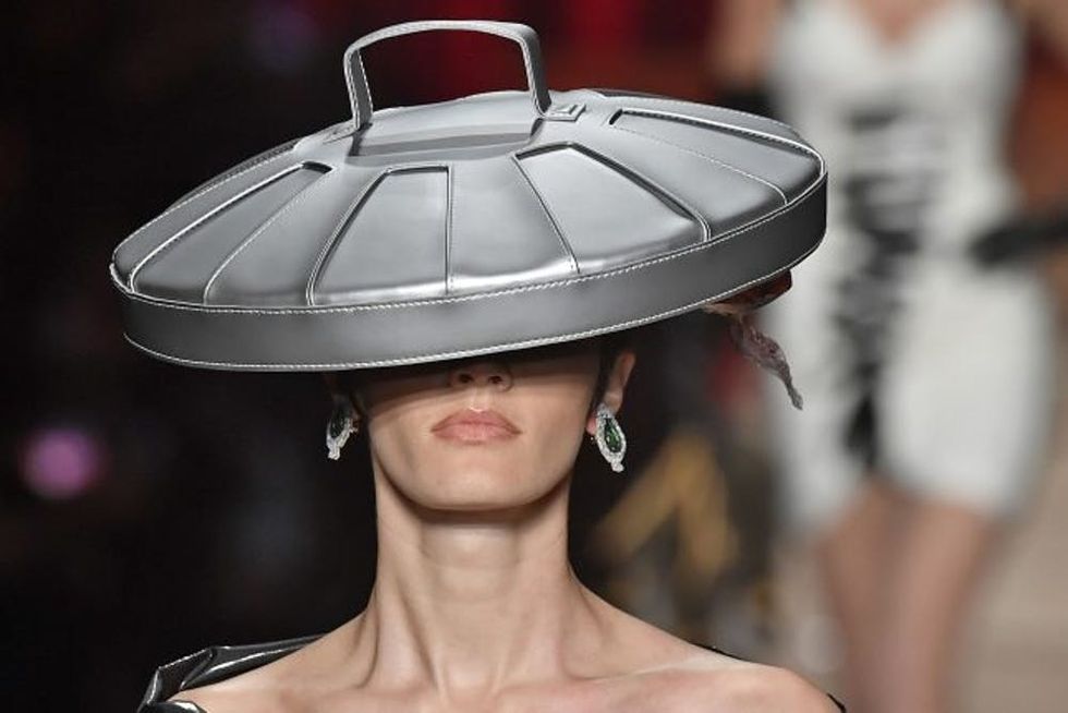 MILAN, ITALY - FEBRUARY 23: A model walks the runway at the Moschino Ready to Wear fashion show during Milan Fashion Week Fall/Winter 2017/18 on February 23, 2017 in Milan, Italy. (Photo by Victor VIRGILE/Gamma-Rapho via Getty Images)