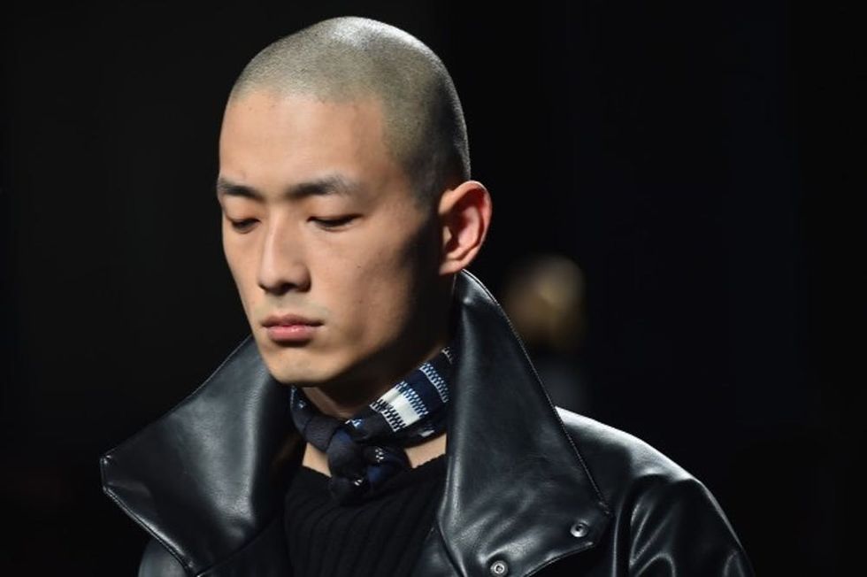 MILAN, ITALY - JANUARY 17: A model walks the runway at the Bottega Veneta show during Milan Men's Fashion Week Fall/Winter 2016/17 on January 17, 2016 in Milan, Italy. (Photo by Stefania D'Alessandro/Getty Images)