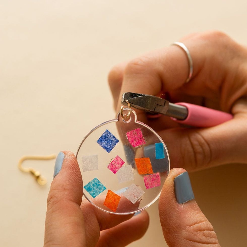 model connects jump rings and earring hooks to acrylic