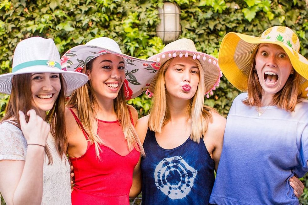 models wear colorful beach hats