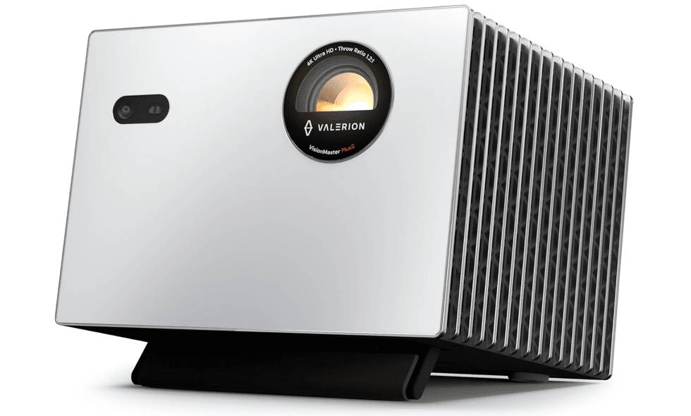 Modern 4K projector with sleek silver design and vented sides.