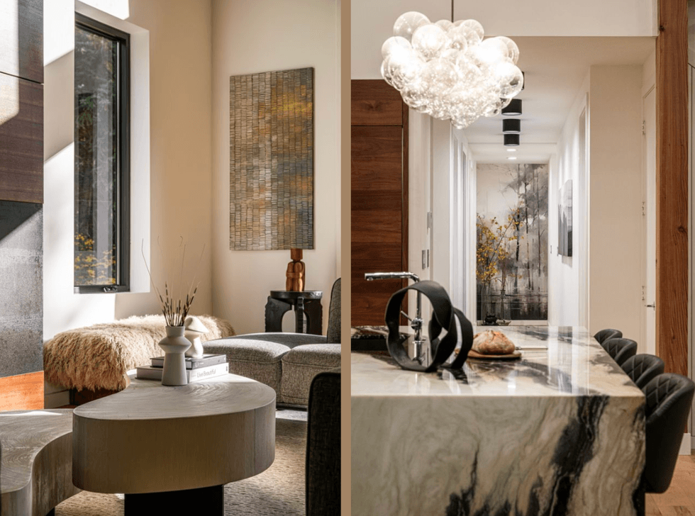 Modern interior with cozy living area and elegant marble kitchen island.