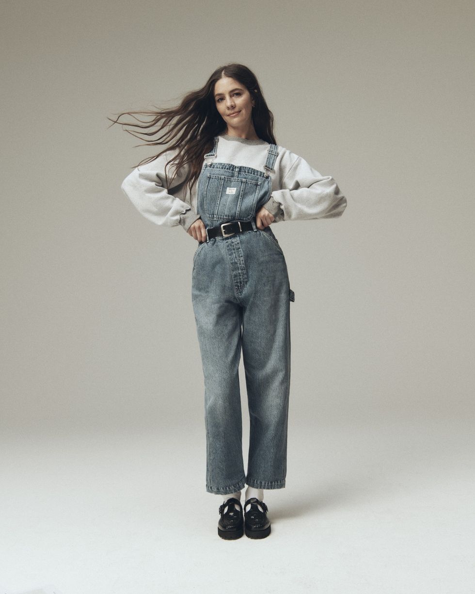 molly dickson wearing the overalls and mary jane shoes