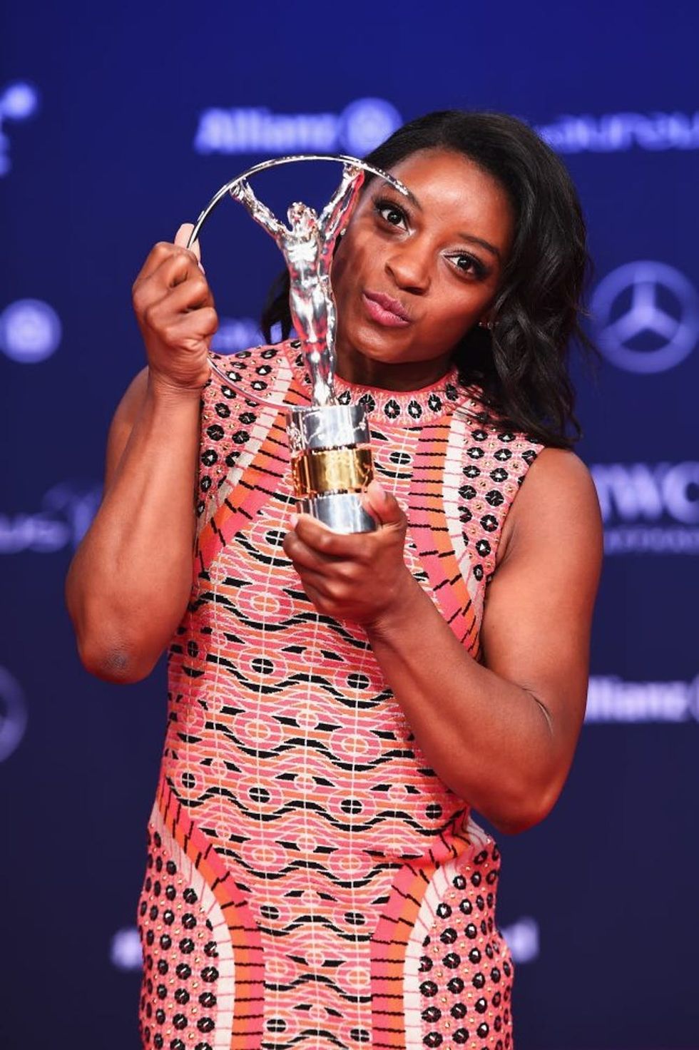 MONACO - FEBRUARY 14: Winner of the Laureus World Sportswoman of the Year Award Gymnast Simone Biles of the US poses with her trophy the Winners Press Conference and Photocall during the 2017 Laureus World Sports Awards at the Salle des Etoiles,Sporting Monte Carlo on February 14, 2017 in Monaco, Monaco. (Photo by Eamonn M. McCormack/Getty Images for Laureus)