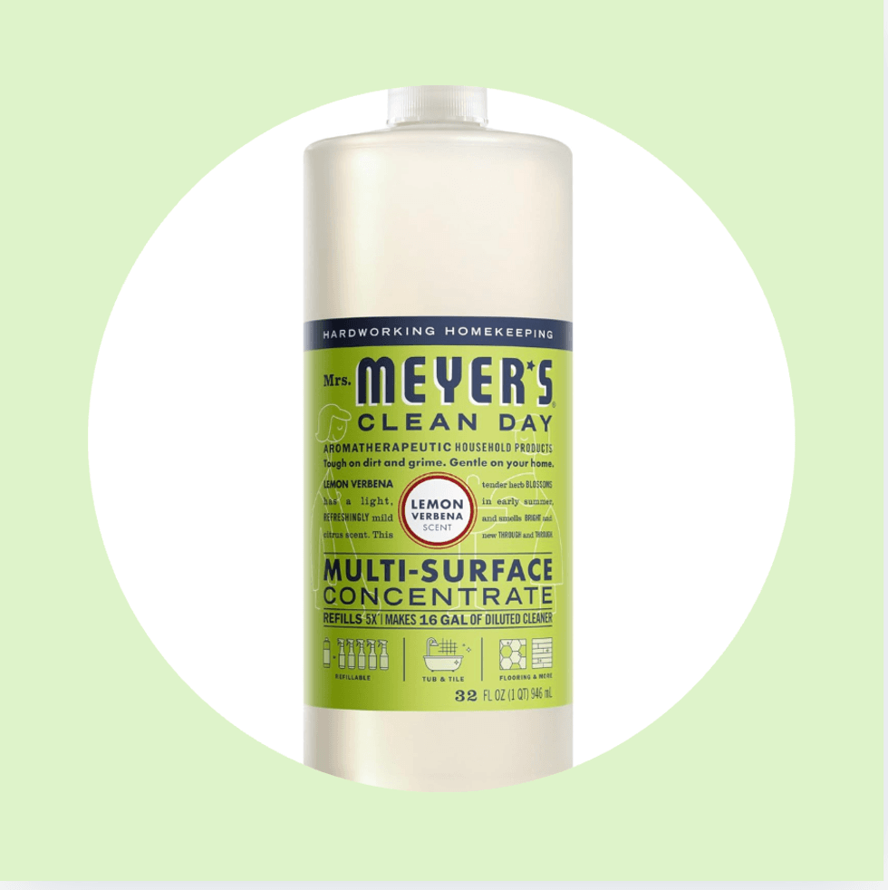 Mrs. Meyer's lemon verbena multi-surface cleaner bottle on a light green background.