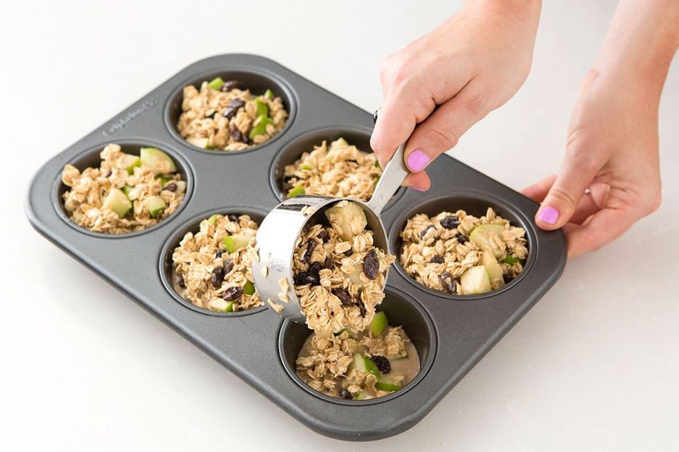 muffin_3 pouring the oats in the muffin tin