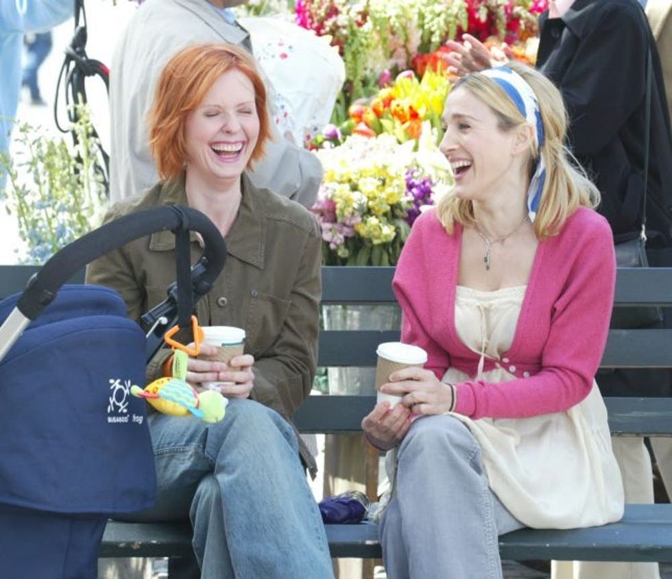 NEW YORK - April 14: Actresses Cynthia Nixon (L) and Sarah Jessica Parker film a scene from "Sex and the City" in Lincoln Square April 14, 2003 in New York City. (Photo by Matthew Peyton/Getty Images)
