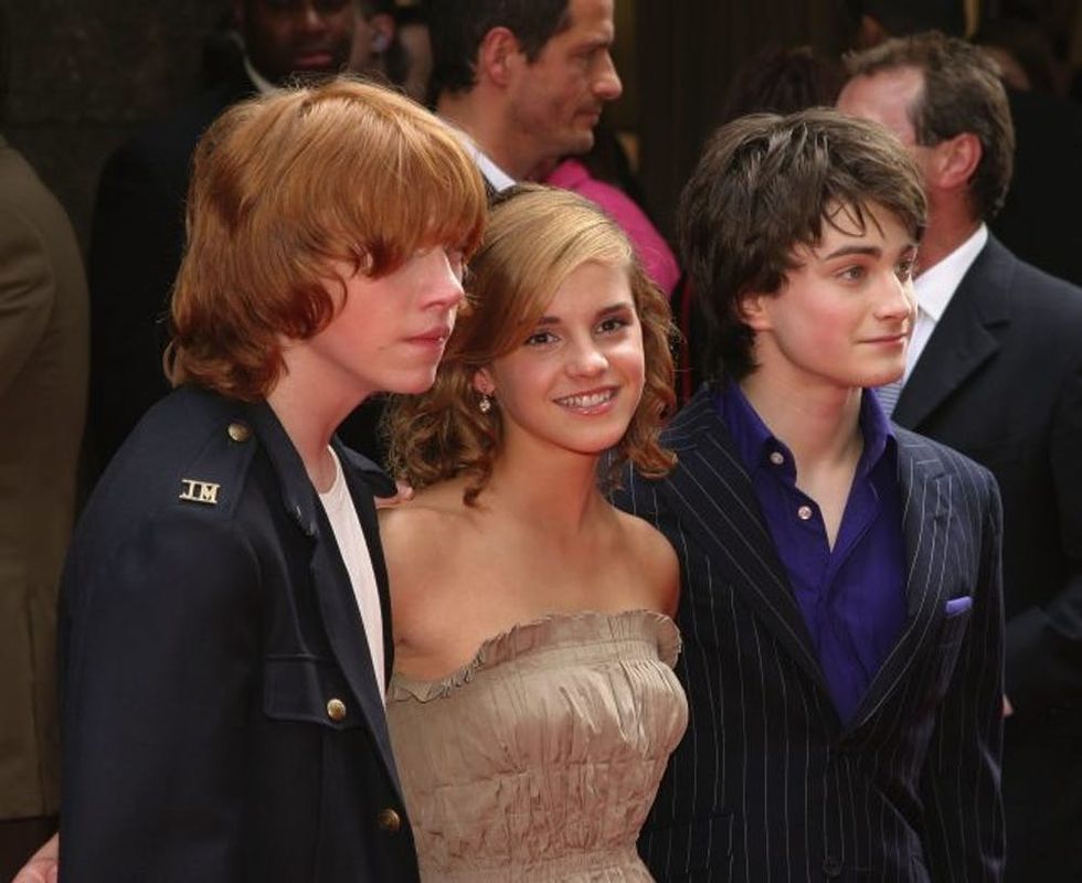 NEW YORK - MAY 23: (US TABS AND HOLLYWOOD REPORTER OUT) (L-R) Actor Rupert Grint, actress Emma Watson, and actor Daniele Radcliffe attend the Premiere of Harry Potter And The Prisoner Of Azkaban at Radio City Music Hall on May 23, 2004 in New York City. (Photo by Thos Robinson/Getty Images)