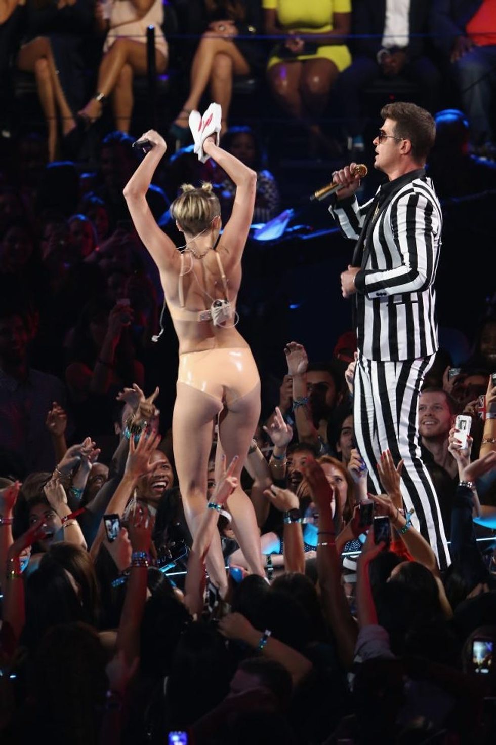 NEW YORK, NY - AUGUST 25: Miley Cyrus and Robin Thicke perform onstage during the 2013 MTV Video Music Awards at the Barclays Center on August 25, 2013 in the Brooklyn borough of New York City. (Photo by Neilson Barnard/Getty Images for MTV)