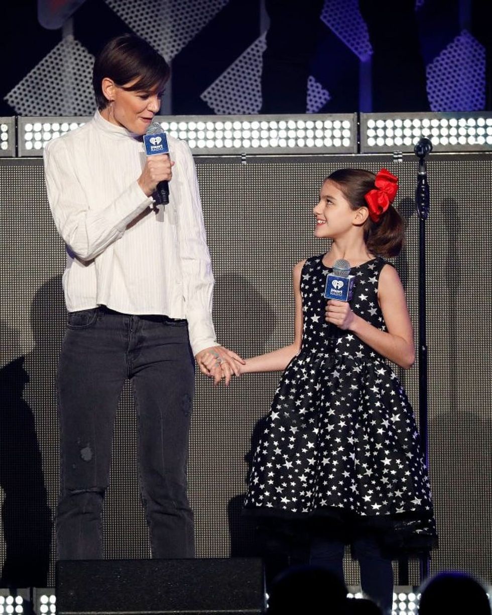 NEW YORK, NY - DECEMBER 08: Katie Holmes and Suri Cruise perform during the 2017 Z100 Jingle Ball at Madison Square Garden on December 8, 2017 in New York City. (Photo by Taylor Hill/FilmMagic)