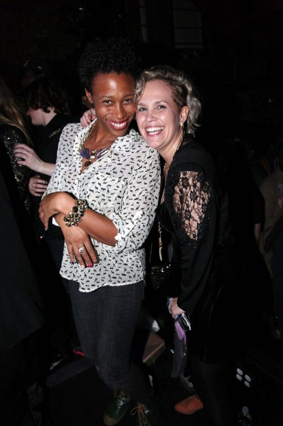 NEW YORK, NY - DECEMBER 20: Editor-In-Chief at Okayplayer.com, Partner at Iron Lady Management, and Tour Manager at The Roots, Ginny Suss (r) and guest attend Brooklyn Bowl on December 20, 2012, in New York City. (Photo by Johnny Nunez/WireImage)