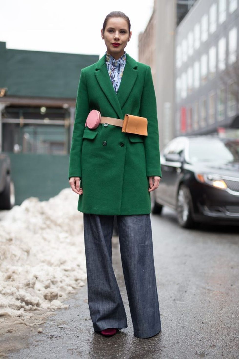 NEW YORK, NY - FEBRUARY 11: Marina Ingvarsson is seen attending TIBI during New York Fashion Week wearing a green wool coat with grey pants and pouch belt on February 11, 2017 in New York City. (Photo by Matthew Sperzel/Getty Images)