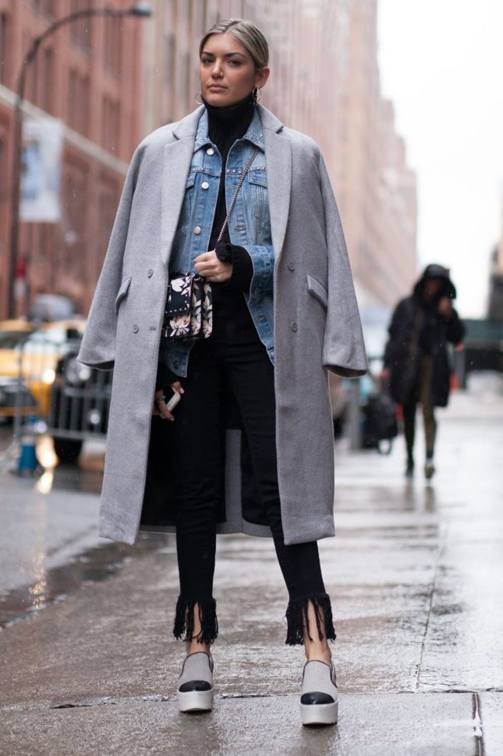 NEW YORK, NY - FEBRUARY 12: Emily Luciano is seen attending Public School during New York Fashion Week wearing a grey wool coat with denim blue jean jacket on February 12, 2017 in New York City. (Photo by Matthew Sperzel/Getty Images)