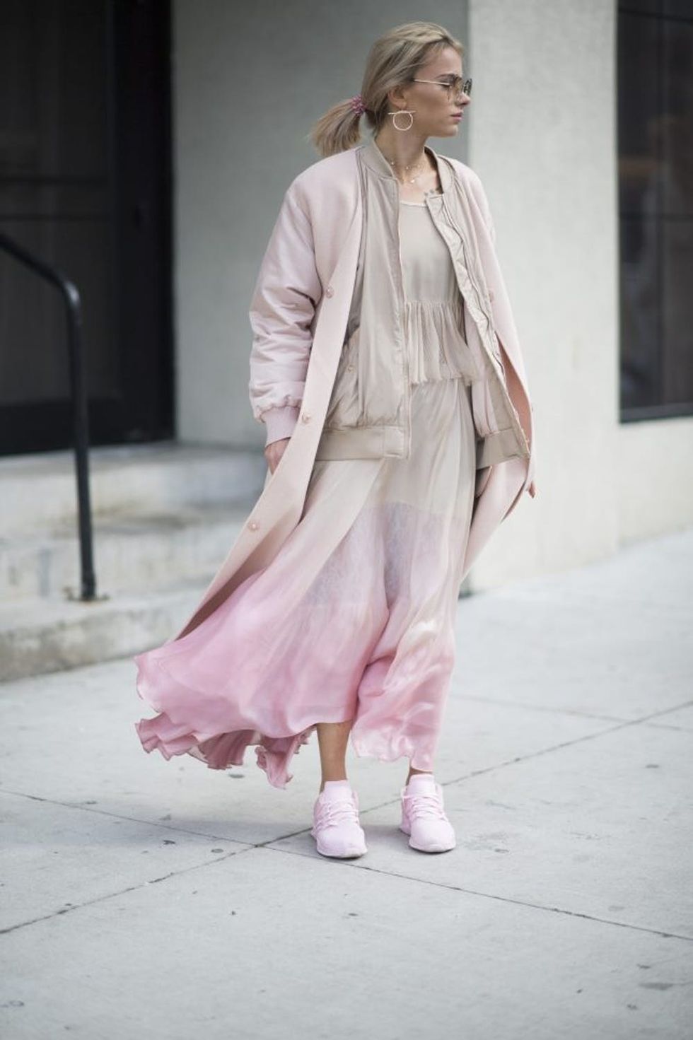 NEW YORK, NY - FEBRUARY 13: A guest seen wearing a pink bomberjacket in the streets of Manhattan on February 13, 2017 in New York City. (Photo by Timur Emek/Getty Images)