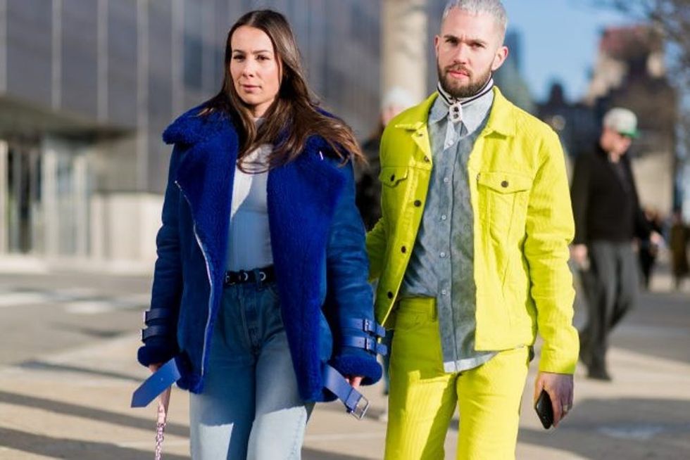 NEW YORK, NY - FEBRUARY 14: A couple outside Coach on February 14, 2017 in New York City. (Photo by Christian Vierig/Getty Images)