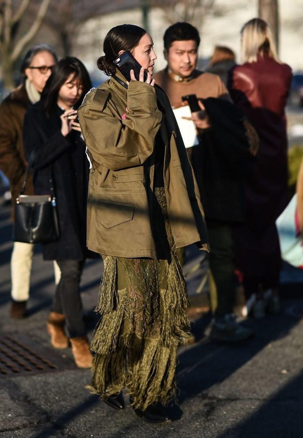 NEW YORK, NY - FEBRUARY 14: Rachael Wang is seen wearing a green jacket and green fringed pants outside the Coach show during New York Fashion Week: Women's Fall/Winter 2017 on February 14, 2017 in New York City. (Photo by Daniel Zuchnik/Getty Images)