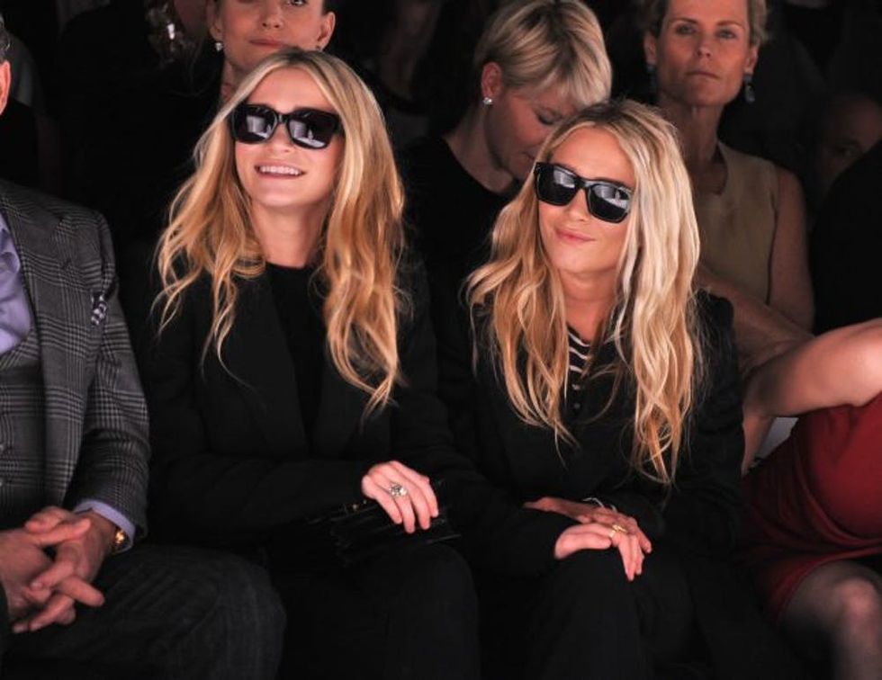 NEW YORK, NY - FEBRUARY 15: Ashley Olsen and Mary-Kate Olsen attend the J. Mendel Fall 2012 fashion show during Mercedes-Benz Fashion Week at The Theatre at Lincoln Center on February 15, 2012 in New York City. (Photo by Stephen Lovekin/Getty Images for Mercedes-Benz Fashion Week)