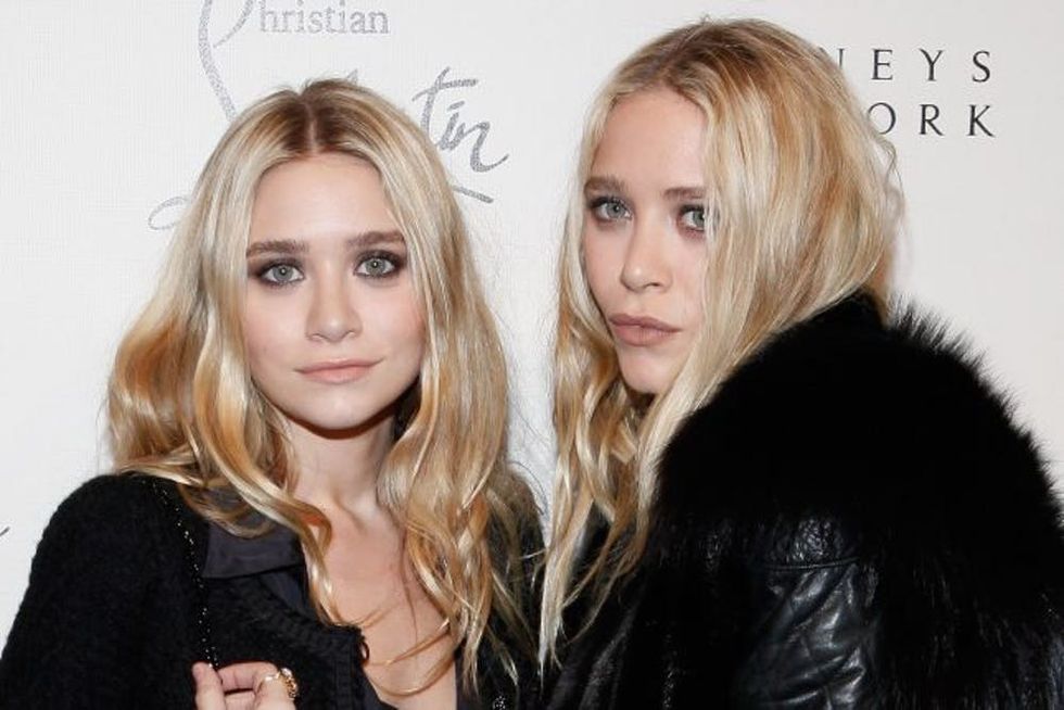 NEW YORK, NY - NOVEMBER 01: Ashley Olsen and Mary-Kate Olsen attend the Christian Louboutin Cocktail party at Barneys New York on November 1, 2011 in New York City. (Photo by Cindy Ord/Getty Images)