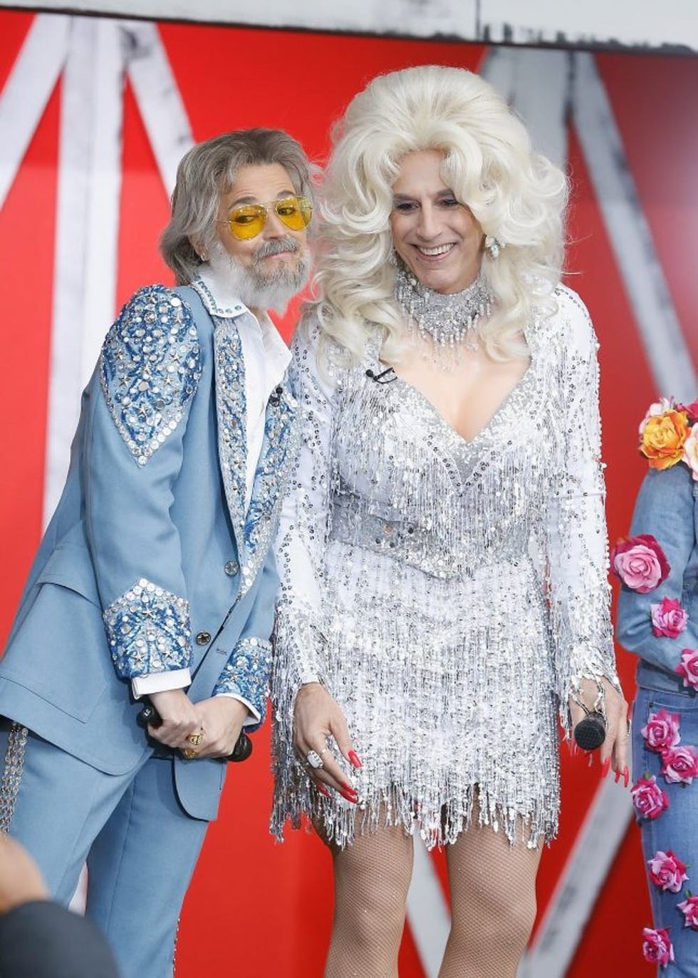 NEW YORK, NY - OCTOBER 31: Savannah Guthrie as Kenny Rogers and Matt Lauer as Dolly Parton attend Today's Halloween Extravaganza 2017 at Rockefeller Plaza on October 31, 2017 in New York City. (Photo by John Lamparski/WireImage)